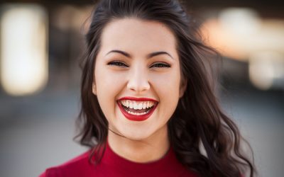 young-woman-smiling-happily-at-the-camera